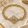 Oro Laminado Fancy Bracelet, Gold Filled Style Flower and Teardrop Design, with White Cubic Zirconia, Polished, Golden Finish, 03.357.0007.07 (06 MM Thickness, 7 Inches Length)