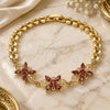 Oro Laminado Fancy Bracelet, Gold Filled Style Flower Design, with Garnet Cubic Zirconia, Polished, Golden Finish, 03.357.0009.1.07 (07 MM Thickness, 7 Inches Length)