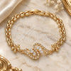 Oro Laminado Fancy Bracelet, Gold Filled Style Flower Design, with White Cubic Zirconia, Polished, Golden Finish, 03.357.0012.07 (06 MM Thickness, 7 Inches Length)