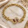 Oro Laminado Fancy Bracelet, Gold Filled Style Flower Design, with Garnet and White Cubic Zirconia, Polished, Golden Finish, 03.357.0012.2.07 (06 MM Thickness, 7 Inches Length)