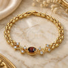 Oro Laminado Fancy Bracelet, Gold Filled Style with Garnet and White Cubic Zirconia, Polished, Golden Finish, 03.357.0013.2.07 (06 MM Thickness, 7 Inches Length)