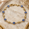 Oro Laminado Fancy Bracelet, Gold Filled Style Evil Eye and Heart Design, Blue Resin Finish, Golden Finish, 03.326.0008.2.08 (07 MM Thickness, 8 Inches Length)