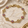 Oro Laminado Fancy Bracelet, Gold Filled Style Evil Eye and Four-leaf Clover Design, Red Resin Finish, Golden Finish, 03.326.0011.1.06 (08 MM Thickness, 6 Inches Length)