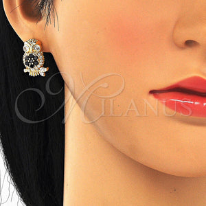 Gold Filled Hoop Earrings — Huggie Hoop Owl Design with Black and White — main product view — SKU 129915 | Oro Laminado aretes de aro — Huggie Hoop Owl diseño with negro and blanco — SKU 129915