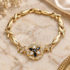 Oro Laminado Fancy Bracelet, Gold Filled Style Flower and Hugs and Kisses Design, with Black and White Cubic Zirconia, Polished, Golden Finish, 03.210.0130.1.08 (07 MM Thickness, 8 Inches Length)