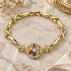 Oro Laminado Fancy Bracelet, Gold Filled Style Flower and Hugs and Kisses Design, with Multicolor Cubic Zirconia, Polished, Golden Finish, 03.210.0130.2.08 (07 MM Thickness, 8 Inches Length)