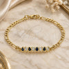 Oro Laminado Fancy Bracelet, Gold Filled Style Teardrop Design, with Black and White Cubic Zirconia, Polished, Golden Finish, 03.63.2152.1.07 (04 MM Thickness, 7 Inches Length)