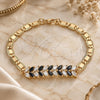 Oro Laminado Fancy Bracelet, Gold Filled Style Leaf Design, with Black and White Cubic Zirconia, Polished, Golden Finish, 03.63.2153.1.07 (06 MM Thickness, 7 Inches Length)