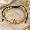 Oro Laminado Fancy Bracelet, Gold Filled Style Infinite and Ball Design, with Multicolor Cubic Zirconia, Polished, Golden Finish, 03.341.0031.11 (04 MM Thickness, 11 Inches Length)
