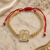 Oro Laminado Fancy Bracelet, Gold Filled Style Guadalupe and Ball Design, with White Micro Pave, Polished, Golden Finish, 03.207.0112.11 (04 MM Thickness, 11 Inches Length)