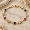 Oro Laminado Fancy Bracelet, Gold Filled Style Elephant Design, with Garnet and Black Crystal, Polished, Golden Finish, 03.213.0093.08 (07 MM Thickness, 8 Inches Length)
