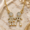 Oro Laminado Pendant Necklace, Gold Filled Style Little Boy and Little Girl Design, with White Micro Pave, Polished, Golden Finish, 04.94.0032.18 (02 MM Thickness, 18 Inches Length)