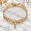 Oro Laminado Semanario Bangle, Gold Filled Style Judaica and Hand of God Design, with White Cubic Zirconia, Diamond Cutting Finish, Tricolor, 07.253.0007.06 (02 MM Thickness, Size 6 (2.75 Diameter))