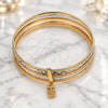 Oro Laminado Semanario Bangle, Gold Filled Style Owl Design, with Garnet Crystal, Diamond Cutting Finish, Tricolor, 07.253.0009.06 (02 MM Thickness, Size 6 (2.75 Diameter))