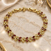 Oro Laminado Tennis Bracelet, Gold Filled Style Leaf Design, with Garnet and White Cubic Zirconia, Polished, Golden Finish, 03.283.0030.1.08 (09 MM Thickness, 8 Inches Length)
