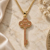 Oro Laminado Pendant Necklace, Gold Filled Style key Design, with Garnet Micro Pave, Polished, Golden Finish, 04.344.0008.1.20 (02 MM Thickness, 20 Inches Length)