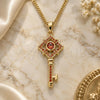 Oro Laminado Pendant Necklace, Gold Filled Style key Design, with Garnet Micro Pave, Polished, Golden Finish, 04.344.0011.1.20 (02 MM Thickness, 20 Inches Length)