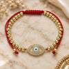 Oro Laminado Adjustable Bolo Bracelet, Gold Filled Style Evil Eye and Ball Design, with White Micro Pave, White Enamel Finish, Golden Finish, 03.299.0062.11 (04 MM Thickness, 11 Inches Length)