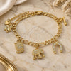 Oro Laminado Charm Bracelet, Gold Filled Style Owl and Elephant Design, Polished, Golden Finish, 03.351.0027.1.07 (05 MM Thickness, 7 Inches Length)