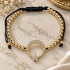 Oro Laminado Adjustable Bolo Bracelet, Gold Filled Style Moon and Flower Design, with White Micro Pave and White Cubic Zirconia, Polished, Golden Finish, 03.299.0070.11 (04 MM Thickness, 11 Inches Length)