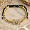 Oro Laminado Adjustable Bolo Bracelet, Gold Filled Style Little Boy and Little Girl Design, with White Micro Pave, Polished, Golden Finish, 03.299.0077.11 (04 MM Thickness, 11 Inches Length)