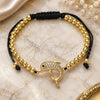 Oro Laminado Adjustable Bolo Bracelet, Gold Filled Style Butterfly and Ball Design, with Black and White Micro Pave, Polished, Golden Finish, 03.299.0083.11 (04 MM Thickness, 11 Inches Length)