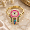 Oro Laminado Multi Stone Ring, Gold Filled Style Hand of God and Judaica Design, with Multicolor Micro Pave, Pink Enamel Finish, Golden Finish, 01.368.0010 (One size fits all)