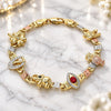 Oro Laminado Fancy Bracelet, Gold Filled Style Elephant and Evil Eye Design, with Garnet and Black Crystal, Polished, Tricolor, 03.380.0004.08 (05 MM Thickness, 8 Inches Length)