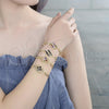 Oro Laminado Fancy Bracelet, Gold Filled Style Flower and Fish Design, with Black and White Cubic Zirconia, Polished, Golden Finish, 03.316.0073.08 (05 MM Thickness, 8 Inches Length)