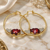 Oro Laminado Large Hoop, Gold Filled Style Elephant and Heart Design, with Garnet and White Crystal, Diamond Cutting Finish, Golden Finish, 02.380.0052.50