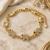 Oro Laminado Fancy Bracelet, Gold Filled Style Elephant Design, with White and Black Crystal, Polished, Golden Finish, 03.380.0035.07 (11 MM Thickness, 7 Inches Length)