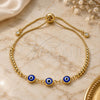 Oro Laminado Adjustable Bolo Bracelet, Gold Filled Style Evil Eye and Ball Design, with White Cubic Zirconia, Blue Resin Finish, Golden Finish, 03.63.2216.1.11 (01 MM Thickness, 11 Inches Length)