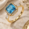 Oro Laminado Multi Stone Ring, Gold Filled Style Baguette Design, with Blue Topaz and White Cubic Zirconia, Polished, Golden Finish, 01.210.0129.2.06 (Size 6)