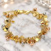 Oro Laminado Charm Bracelet, Gold Filled Style Flower and Ball Design, Polished, Tricolor, 03.331.0196.07 (05 MM Thickness, 7 Inches Length)