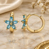 Oro Laminado Huggie Hoop, Gold Filled Style Flower Design, with Aqua Blue Cubic Zirconia, Polished, Golden Finish, 02.210.0496.1.15