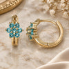 Oro Laminado Huggie Hoop, Gold Filled Style Flower Design, with Aqua Blue Cubic Zirconia, Polished, Golden Finish, 02.210.0497.1.15
