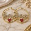 Oro Laminado Large Hoop, Gold Filled Style Nameplate and Heart Design, with White and Garnet Crystal, Diamond Cutting Finish, Golden Finish, 02.380.0080.50