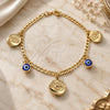 Oro Laminado Charm Bracelet, Gold Filled Style Evil Eye and Concave Cuban Design, Polished, Golden Finish, 03.58.0045.07 (04 MM Thickness, 7 Inches Length)
