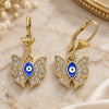 Oro Laminado Dangle Earring, Gold Filled Style Evil Eye and Butterfly Design, with White Crystal, Blue Enamel Finish, Golden Finish, 02.380.0086