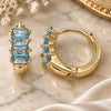 Oro Laminado Huggie Hoop, Gold Filled Style Baguette Design, with Blue Topaz Cubic Zirconia, Polished, Golden Finish, 02.210.0607.2.12