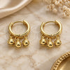 Oro Laminado Huggie Hoop, Gold Filled Style Rattle Charm Design, Polished, Golden Finish, 02.63.2726.15
