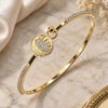 Oro Laminado Individual Bangle, Gold Filled Style Evil Eye Design, with White Micro Pave and White Crystal, Polished, Golden Finish, 07.193.0038.04 (02 MM Thickness, Size 4 (2.25 Diameter))