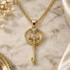 Oro Laminado Pendant Necklace, Gold Filled Style key Design, with Garnet and White Micro Pave, Polished, Golden Finish, 04.156.0432.1.20 (02 MM Thickness, 20 Inches Length)