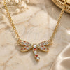 Oro Laminado Pendant Necklace, Gold Filled Style Dragon-Fly Design, with Garnet and White Micro Pave, Polished, Golden Finish, 04.156.0441.1.18 (02 MM Thickness, 18 Inches Length)