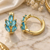 Oro Laminado Huggie Hoop, Gold Filled Style Leaf Design, with Aqua Blue Cubic Zirconia, Polished, Golden Finish, 02.210.0649.2.15