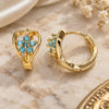 Oro Laminado Huggie Hoop, Gold Filled Style Flower and Heart Design, with Aqua Blue Cubic Zirconia, Polished, Golden Finish, 02.210.0653.1.15