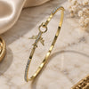 Oro Laminado Individual Bangle, Gold Filled Style Airplane Design, with White Micro Pave and White Crystal, Polished, Golden Finish, 07.193.0043.05 (02 MM Thickness, Size 5 (2.50 Diameter))