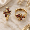 Oro Laminado Huggie Hoop, Gold Filled Style Flower Design, with Garnet and White Cubic Zirconia, Polished, Golden Finish, 02.210.0711.2.15