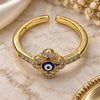 Oro Laminado Multi Stone Ring, Gold Filled Style Evil Eye and Flower Design, with White Micro Pave, Blue Enamel Finish, Golden Finish, 01.310.0017 (One size fits all)