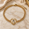 Oro Laminado Fancy Bracelet, Gold Filled Style Heart and Hand of God Design, with White Micro Pave and Sapphire Blue Cubic Zirconia, Polished, Golden Finish, 03.341.0177.08 (04 MM Thickness, 8 Inches Length)